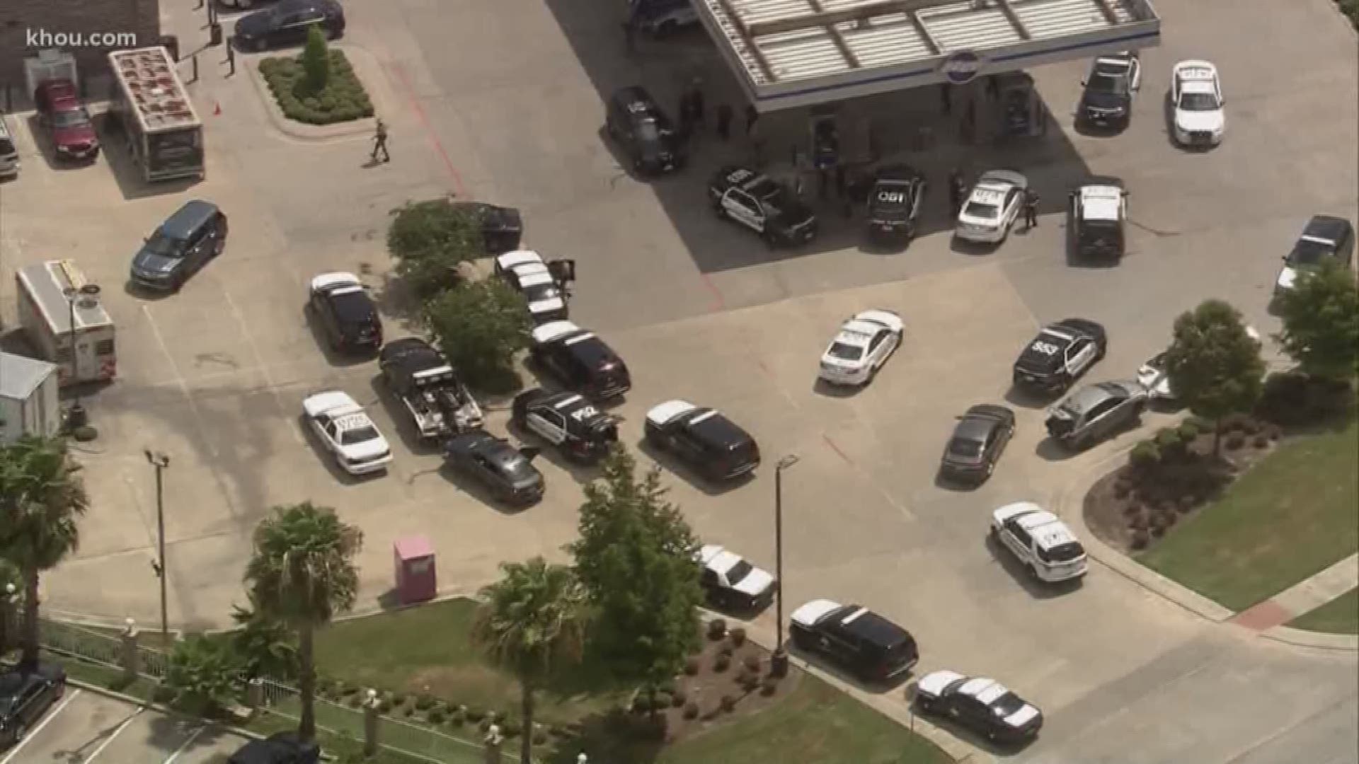 Three people are in custody after robbing a Verizon store and then leading police a chase through northwest Houston.