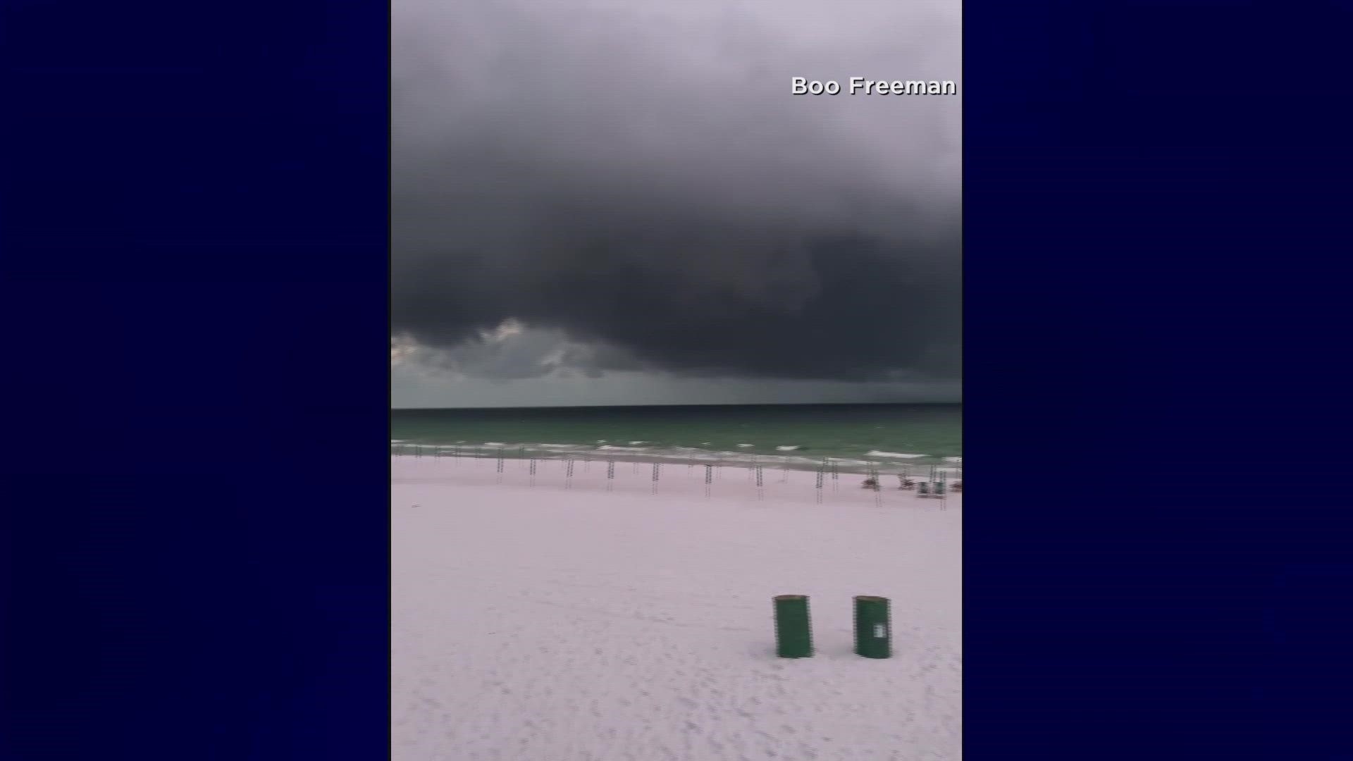 Video captures what appears to be a water spout or tornado off the waters of Henderson Beach in Destin, Florida.