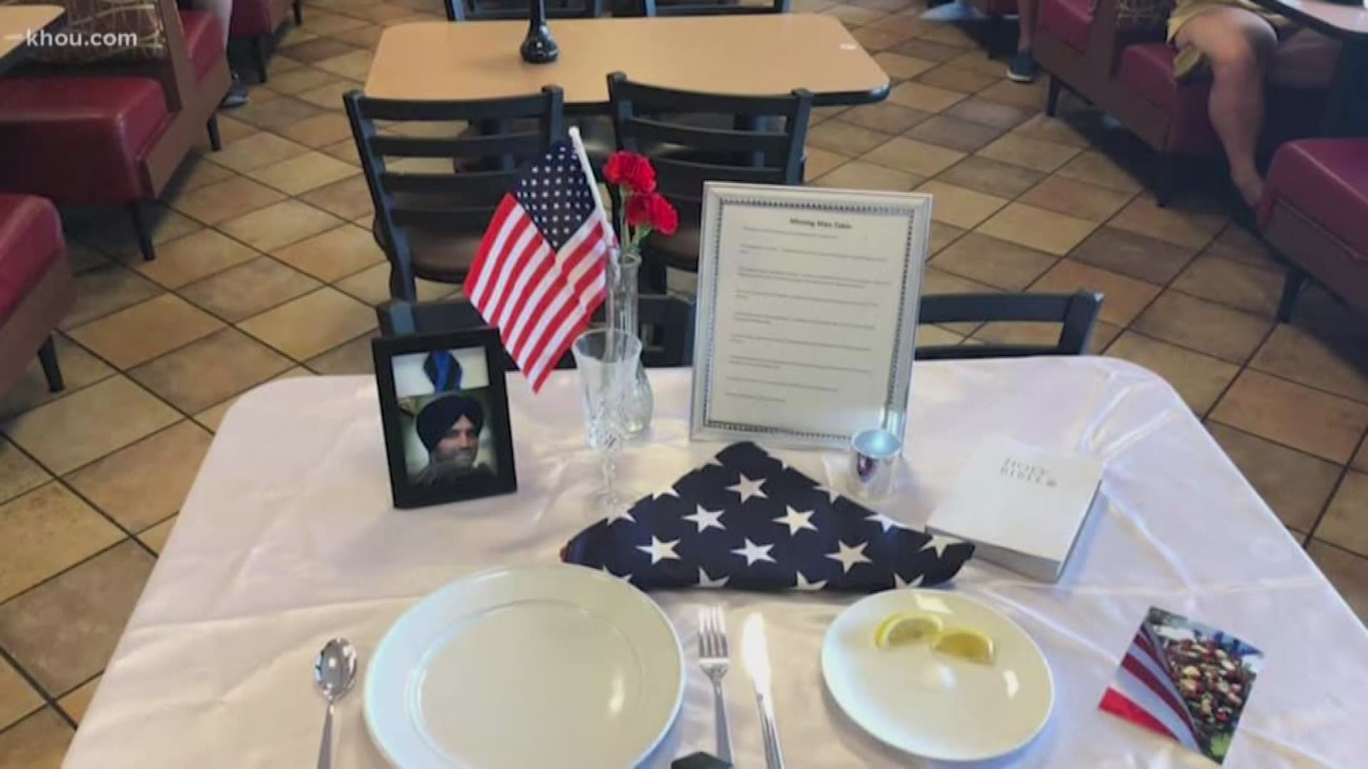 A Chick-fil-A in the Cypress area honored fallen Deputy Sandeep Dhaliwal by turning a table inside the restaurant into a memorial.