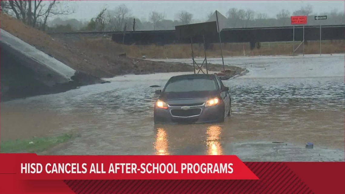 Car stuck in high water in Katy during severe weather