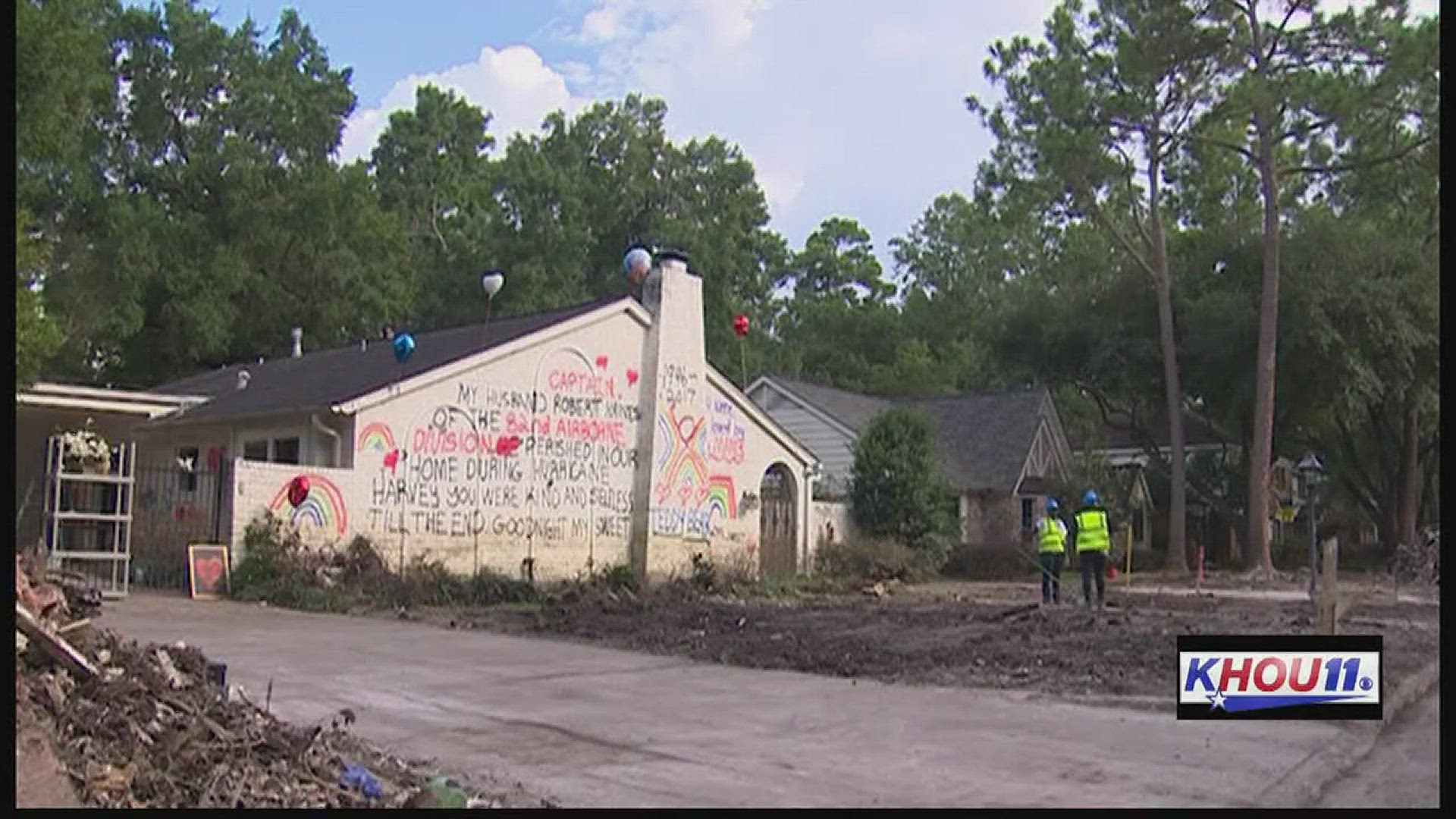 Amidst the contractors working on homes in west Houston is a house with a moving tribute to 71-year-old Robert Haines.