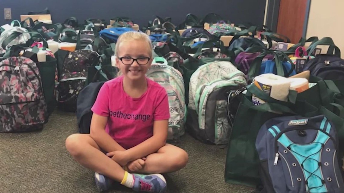 11-year-old girl helps fill backpacks for 800 Conroe ISD students