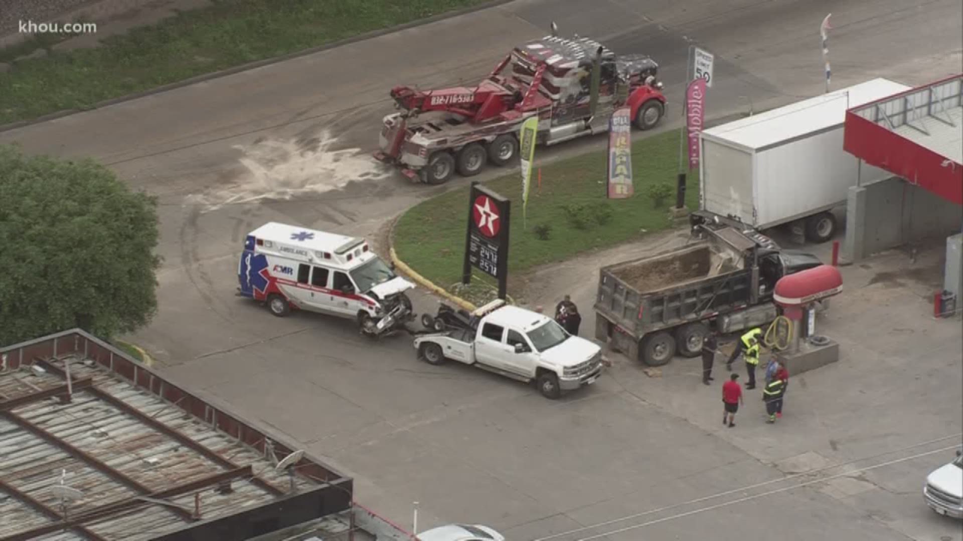 Two people were taken to the hospital Thursday after an ambulance and a dump truck collided in northeast Harris County, sources said.
