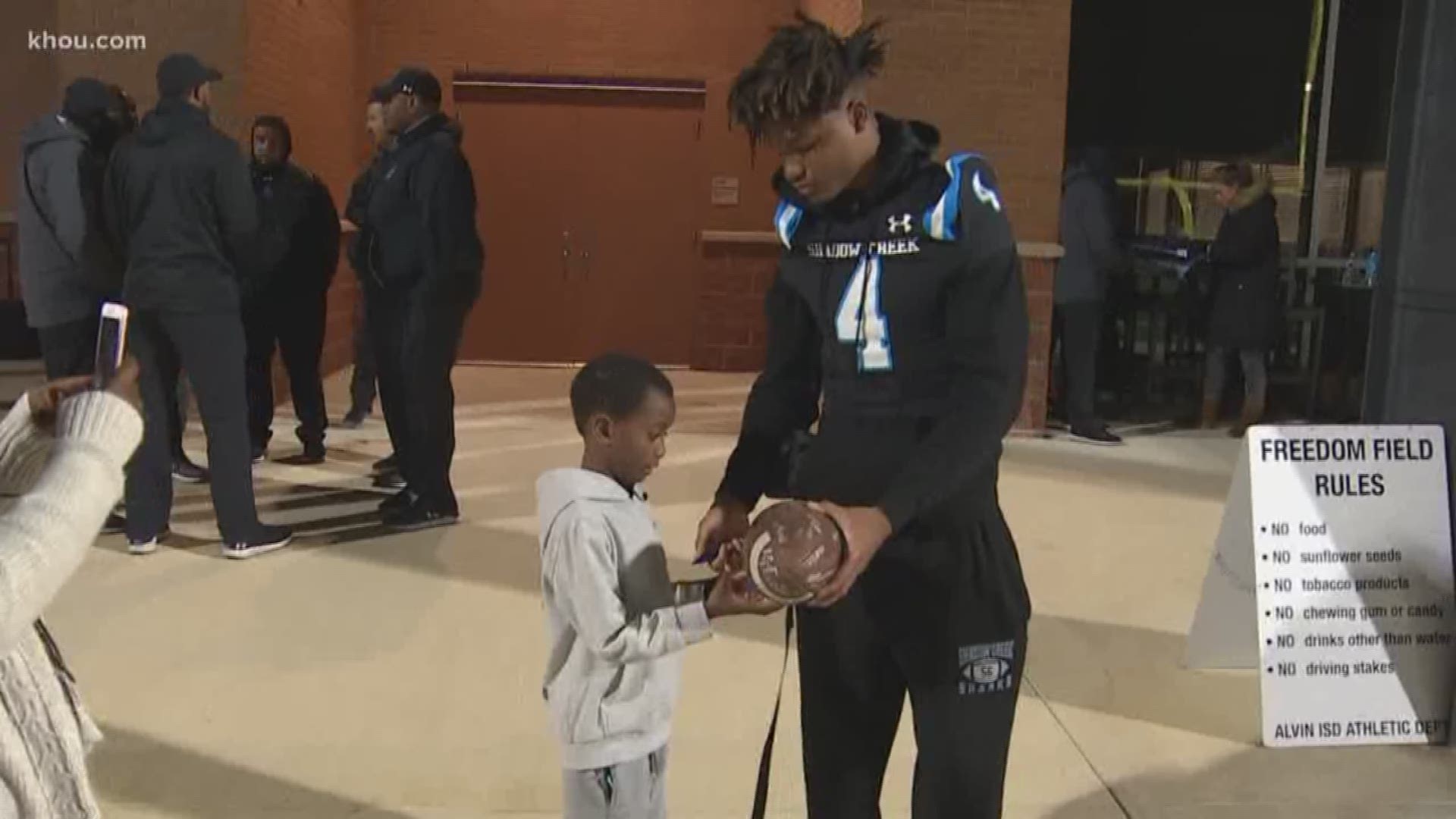 A 6-year-old ran with undefeated Shadow Creek High School football team onto the field for the school’s final home game of the season.