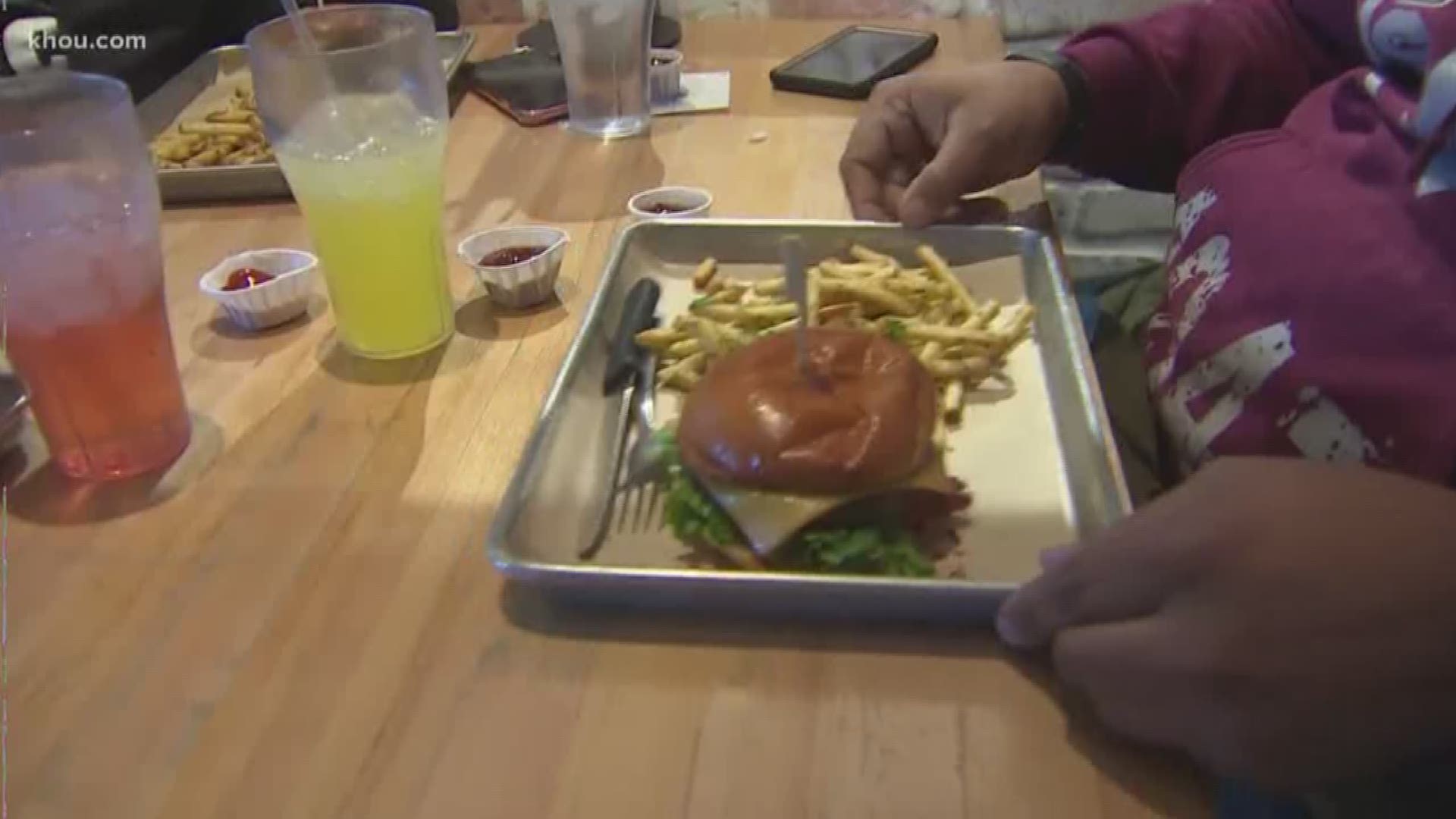 Hopdoddy is one of many businesses lending a hand to furloughed workers. When you show your federal ID, you get a free burger, fries and drink.