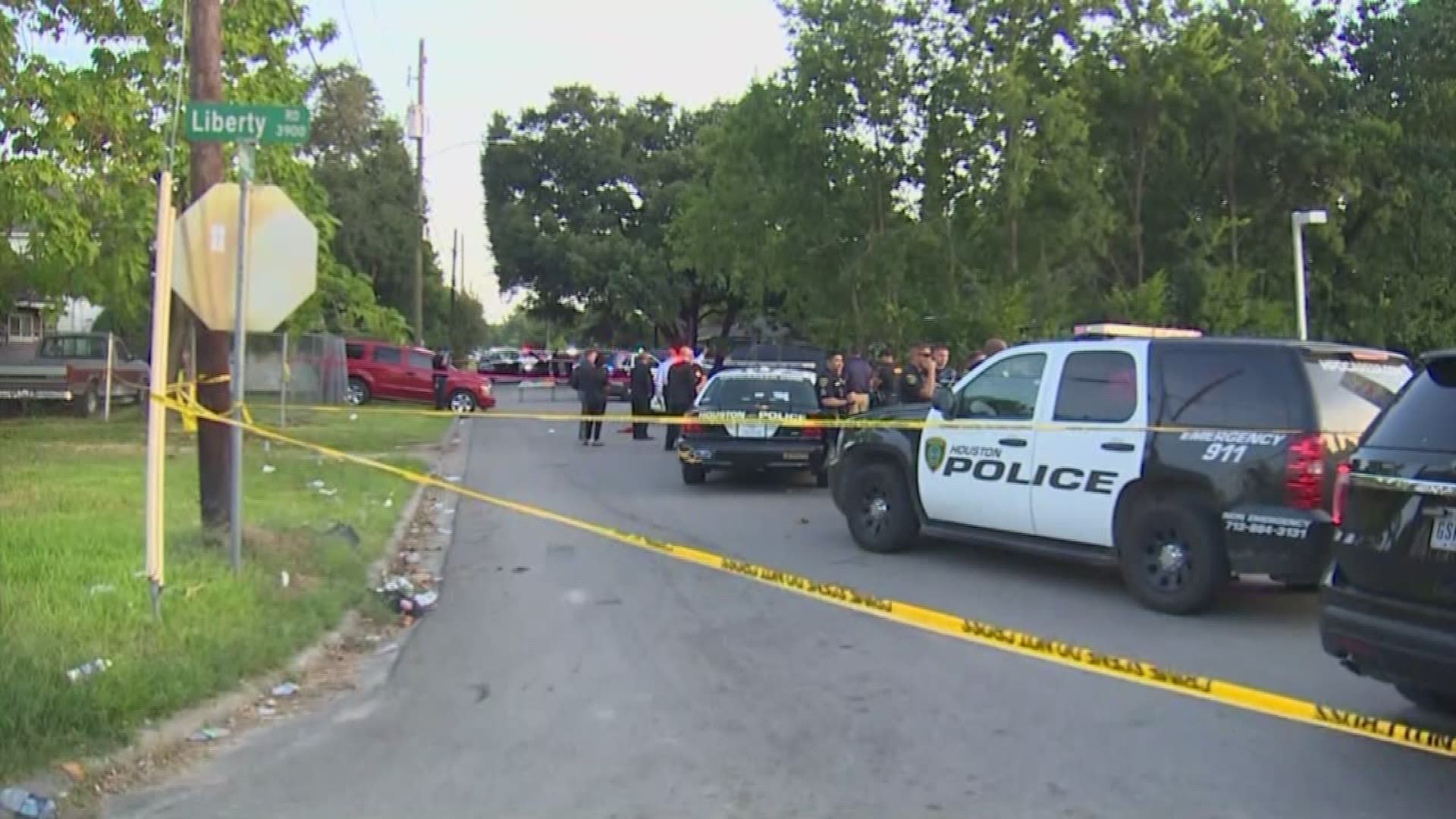 Two Houston Police officers shot a suspect Friday night after he allegedly injured two people with a gun.