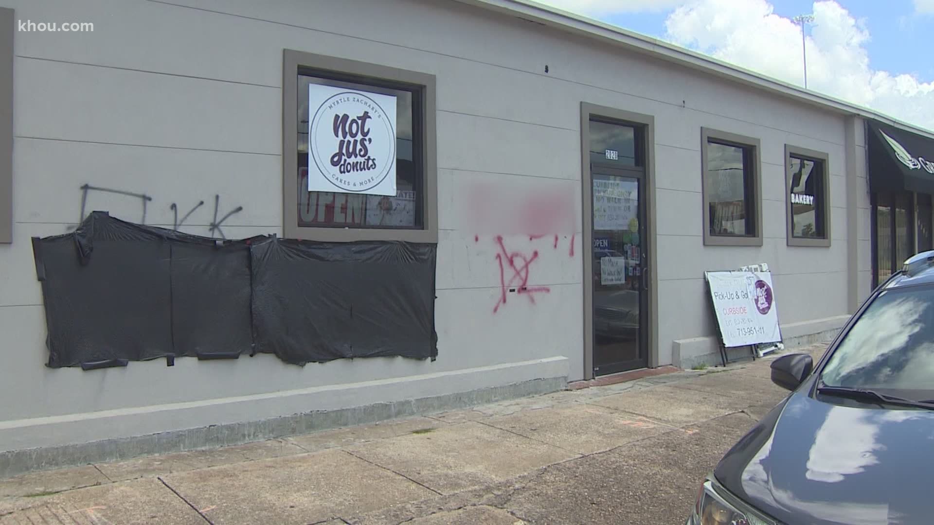 The owners of a bakery in Houston's Third Ward has a message for those who vandalized their shop with anti-police graffiti.