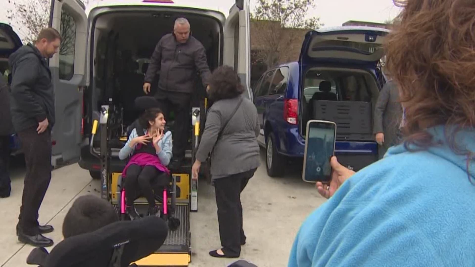 For more than a dozen families in need, Christmas came early in the form of wheelchair-accessible vans.