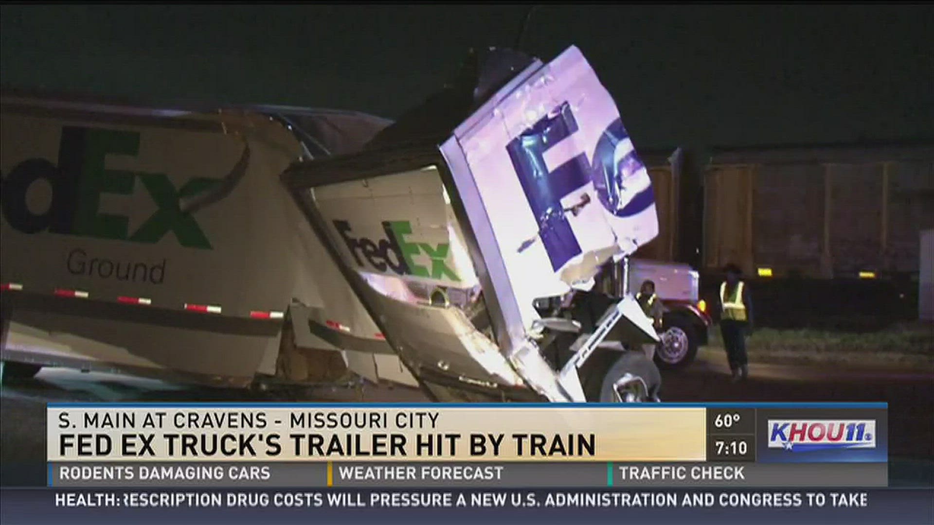 A train hit a trailer of a FedEx truck early Saturday morning in Missouri City, sending debris all over the road.