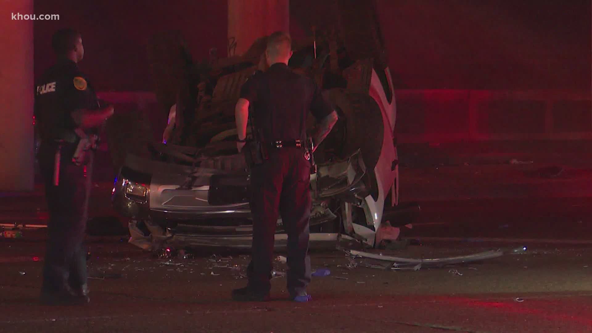 Three people, including an infant, were transported to a hospital after their truck flew off a North Freeway and landed upside-down Thursday night.