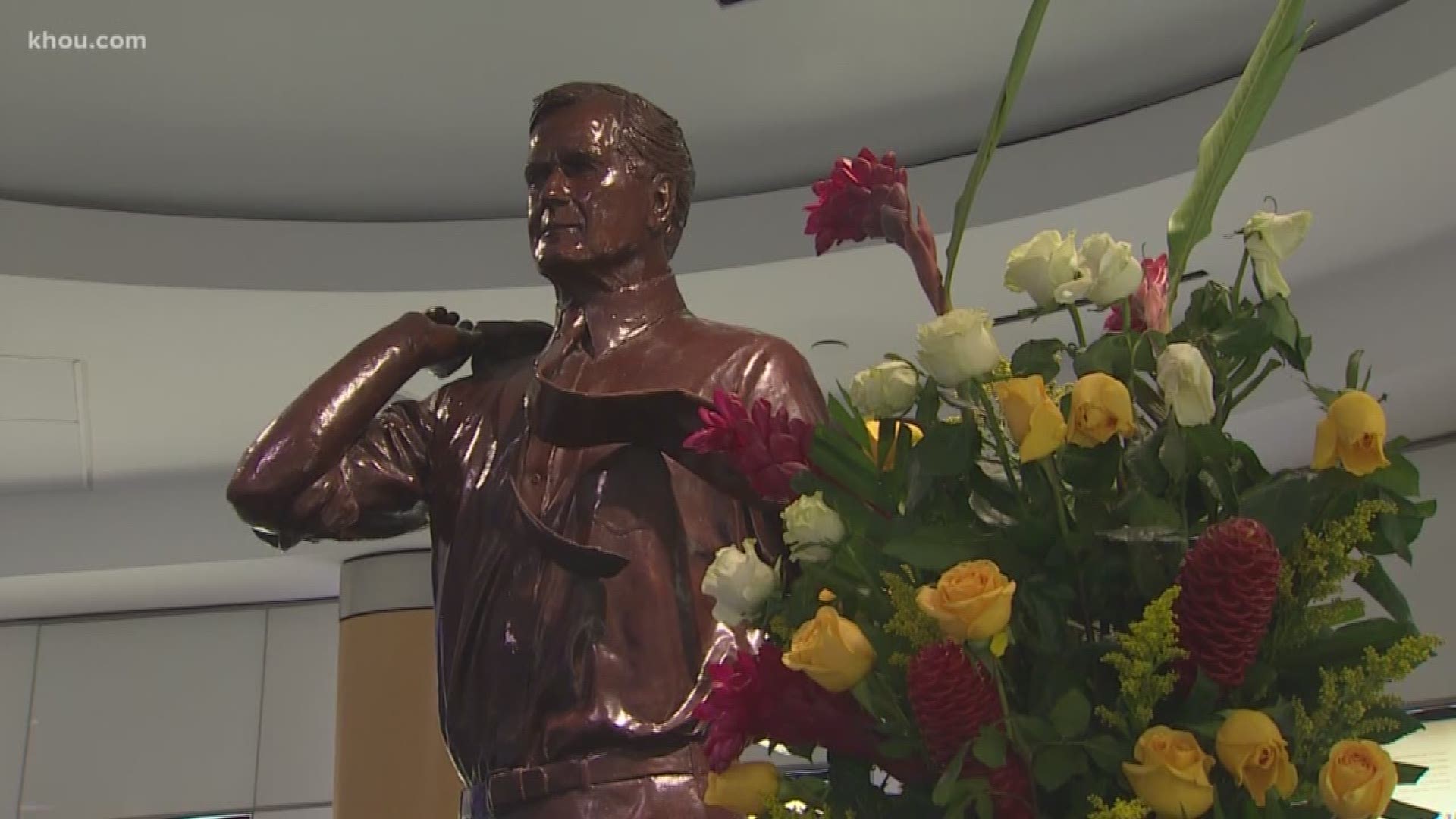 It's hard to miss the name George Bush as you drive into Houston's big airport. Inside Terminal C, the 41st President's statue looms large surrounded by flowers. It's been there since 1997, but now his presence felt more than ever in the airport that bear