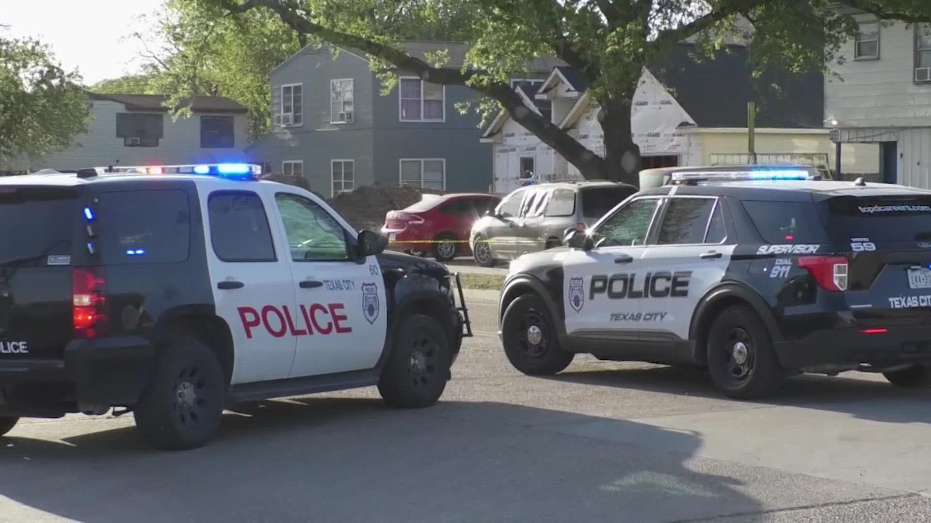 A man who was threatening a woman with a knife Friday was shot by a Texas City police officer, according to the department.