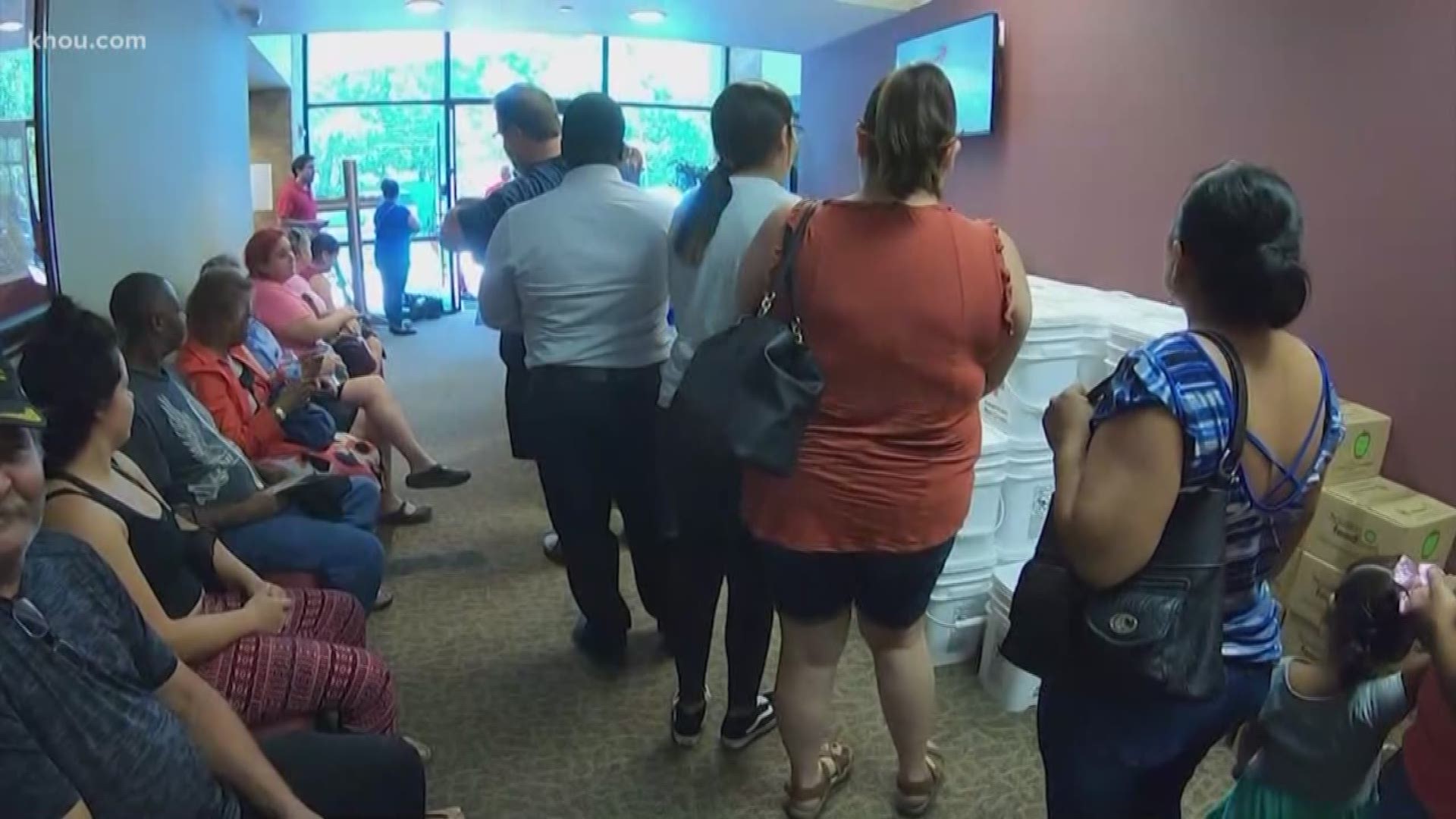 Hundreds of people whose homes were damaged by Imelda's floods are packing the recovery centers in Harris County to pick up food, water and cleaning supplies.