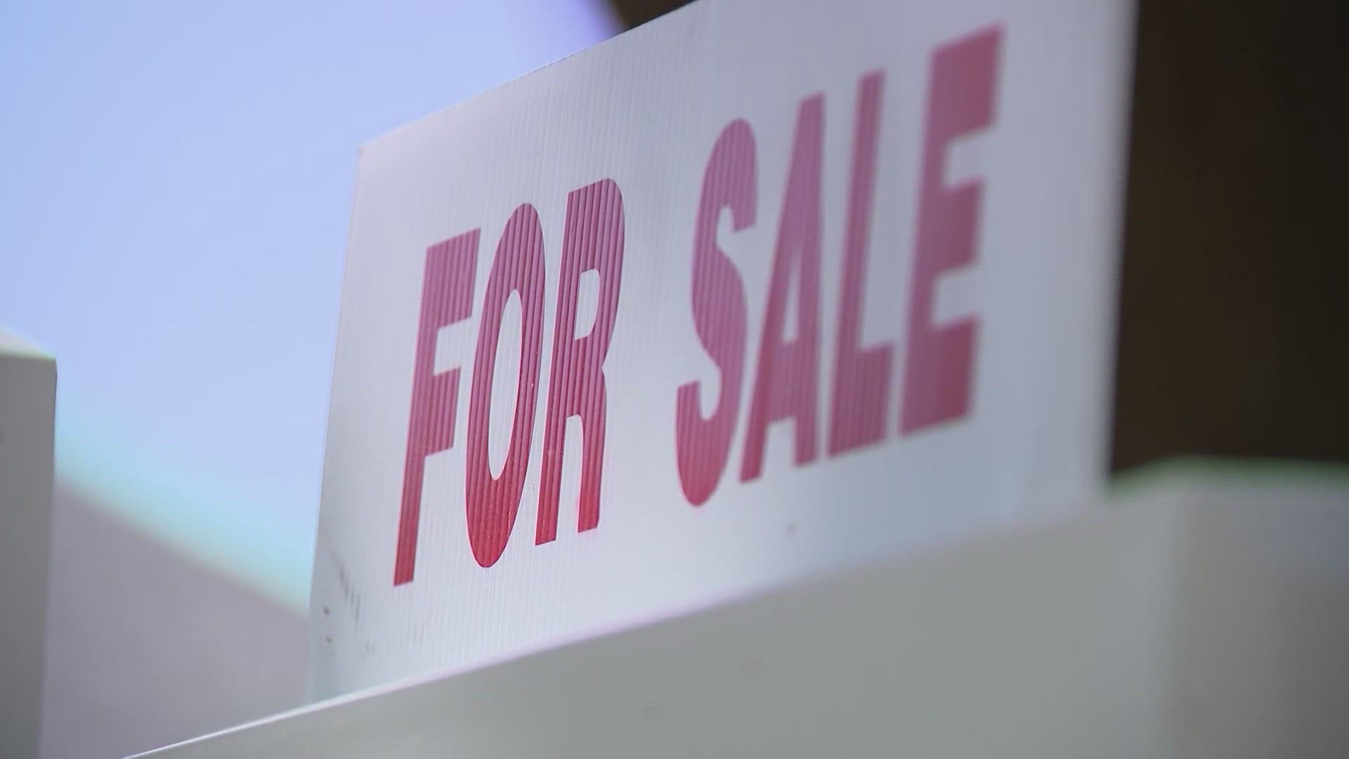 How a Fed rate cut could impact mortgage and credit card costs in