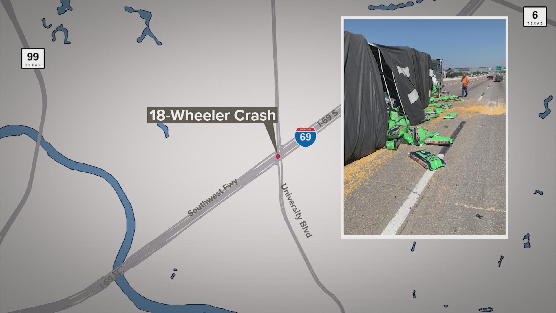An 18-wheeler rollover crash shut down multiple northbound lanes of the Southwest Freeway at University Boulevard in Sugar Land.