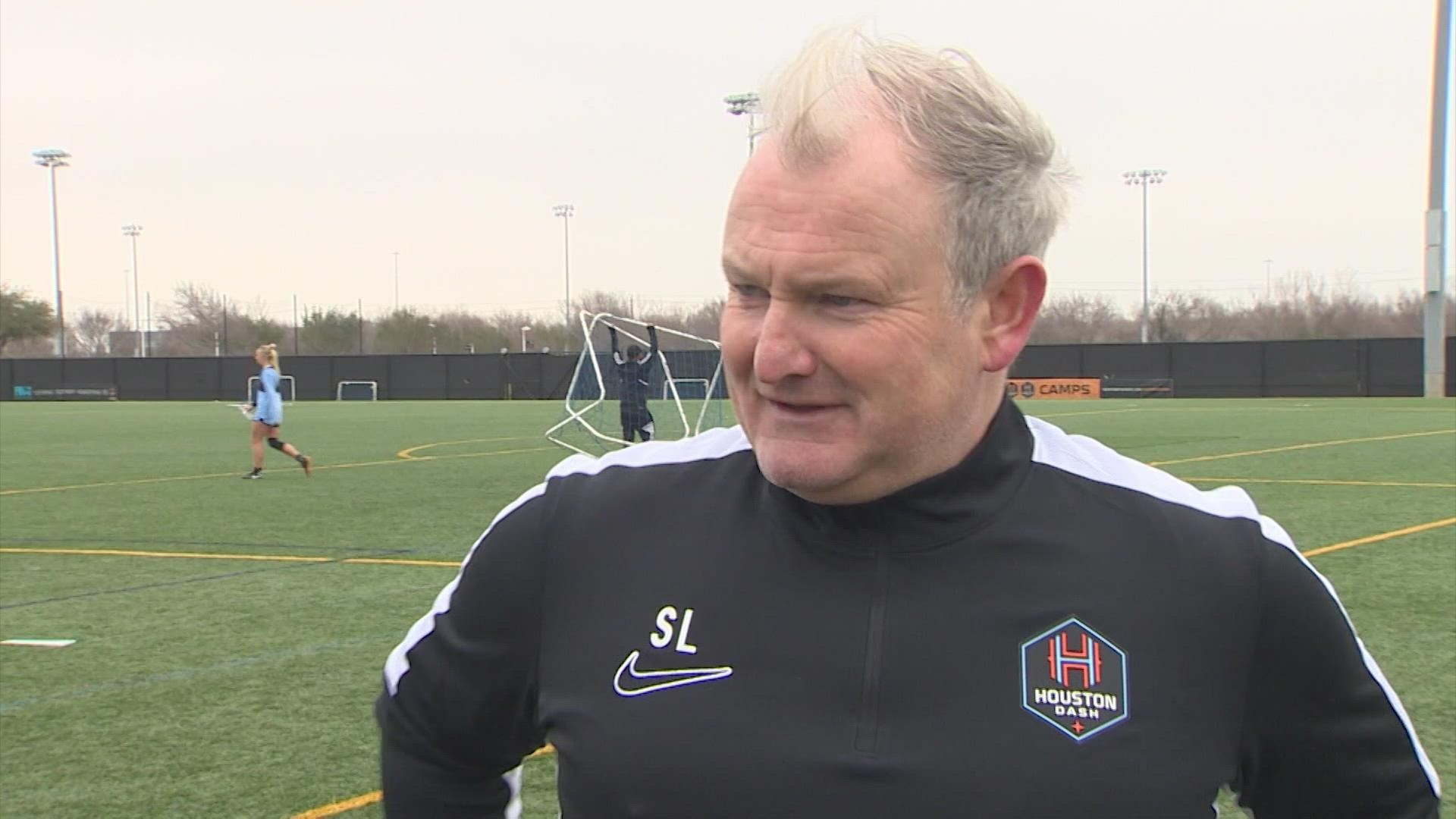 Sam Laity, the new head coach of the Houston Dash, addresses the media following the team’s first preseason training session on January 30, 2023.