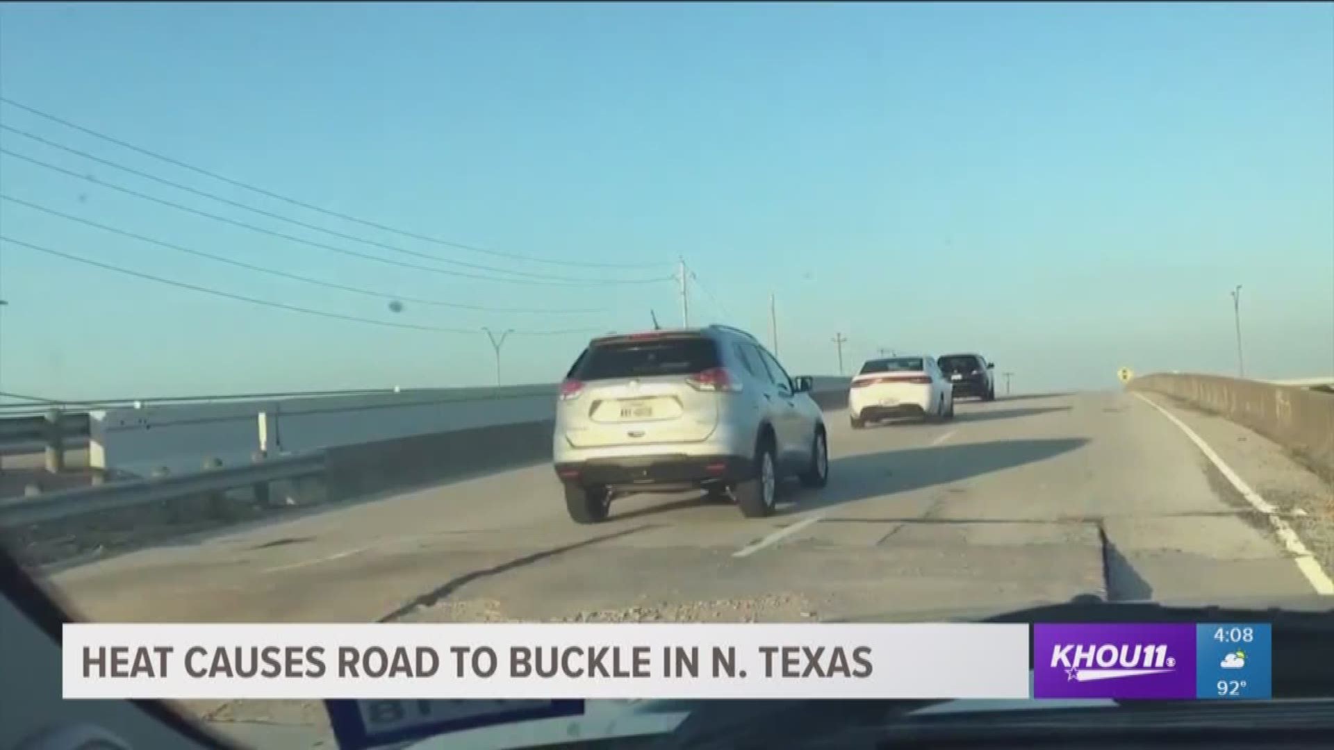 Video recorded by a driver in Grapevine, Texas shows an overpass that buckled due to the high temperatures on Tuesday. 