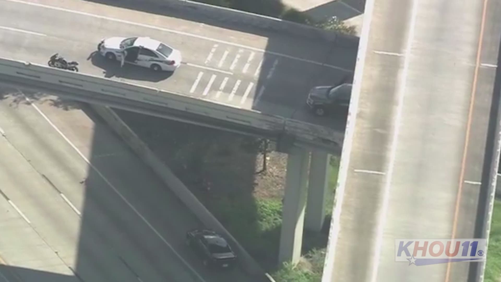 Raw video from Air 11 shows the end of a police chase that started in downtown and went to Houston's east side. It ended when the rider fell from the elevated ramp.