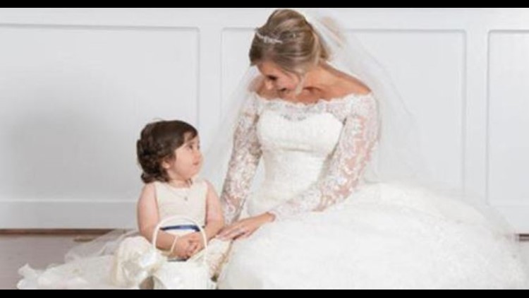Toddler cancer survivor serves as flower girl to bone marrow donor