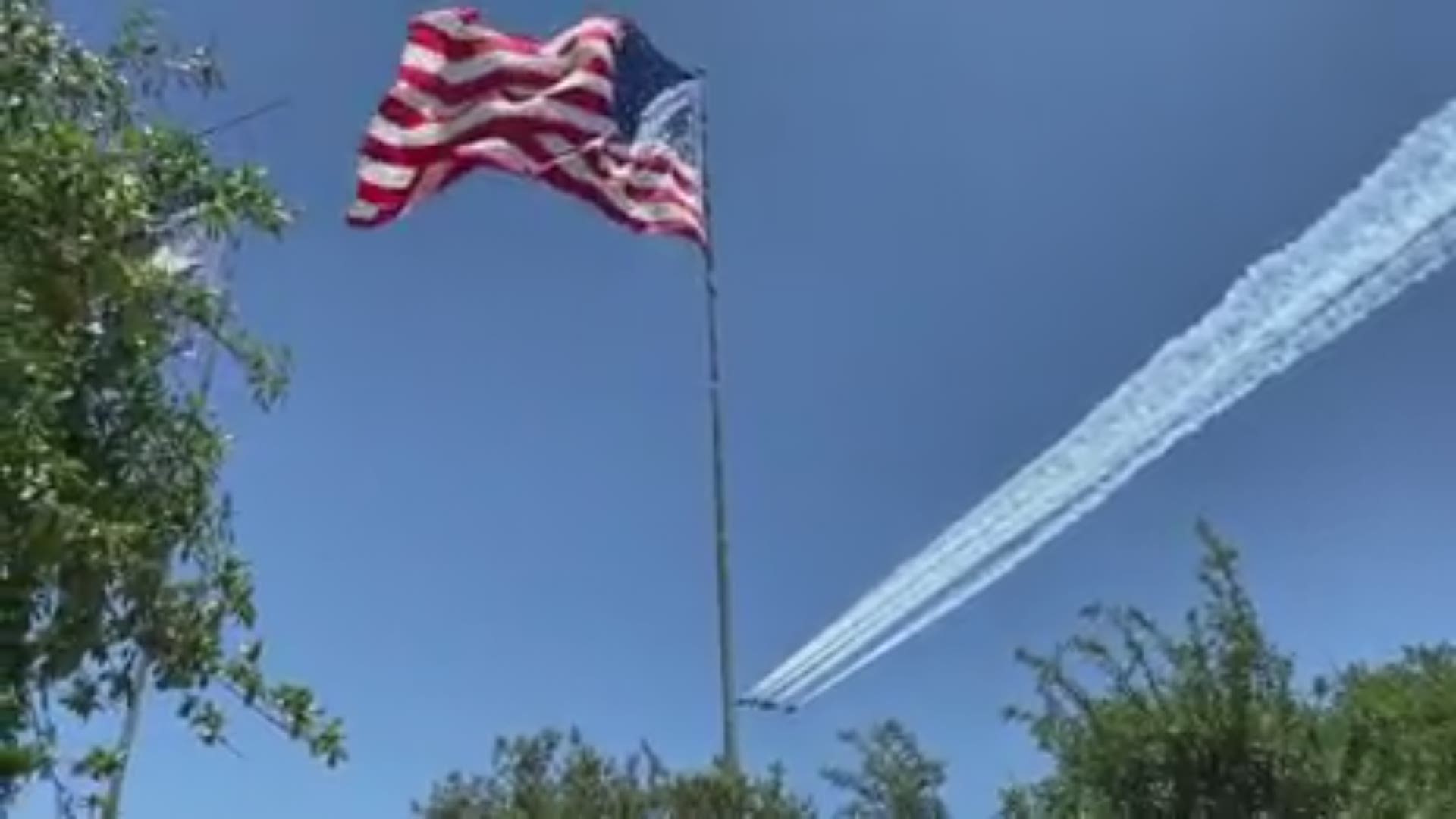 Fred Wilkins captured this picture-perfect video of the Blue Angels' flyover in the Taste of Texas parking lot -- and with it a great shot of the American flag.