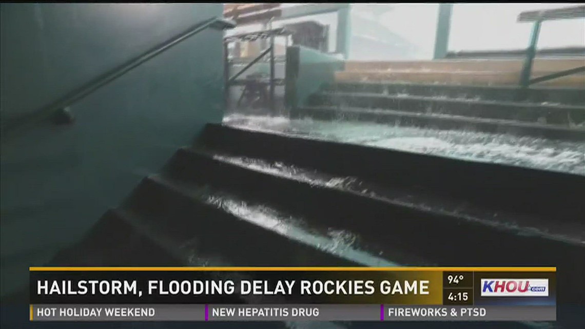 Blanket of hail, flash flooding create wild scene at Coors Field