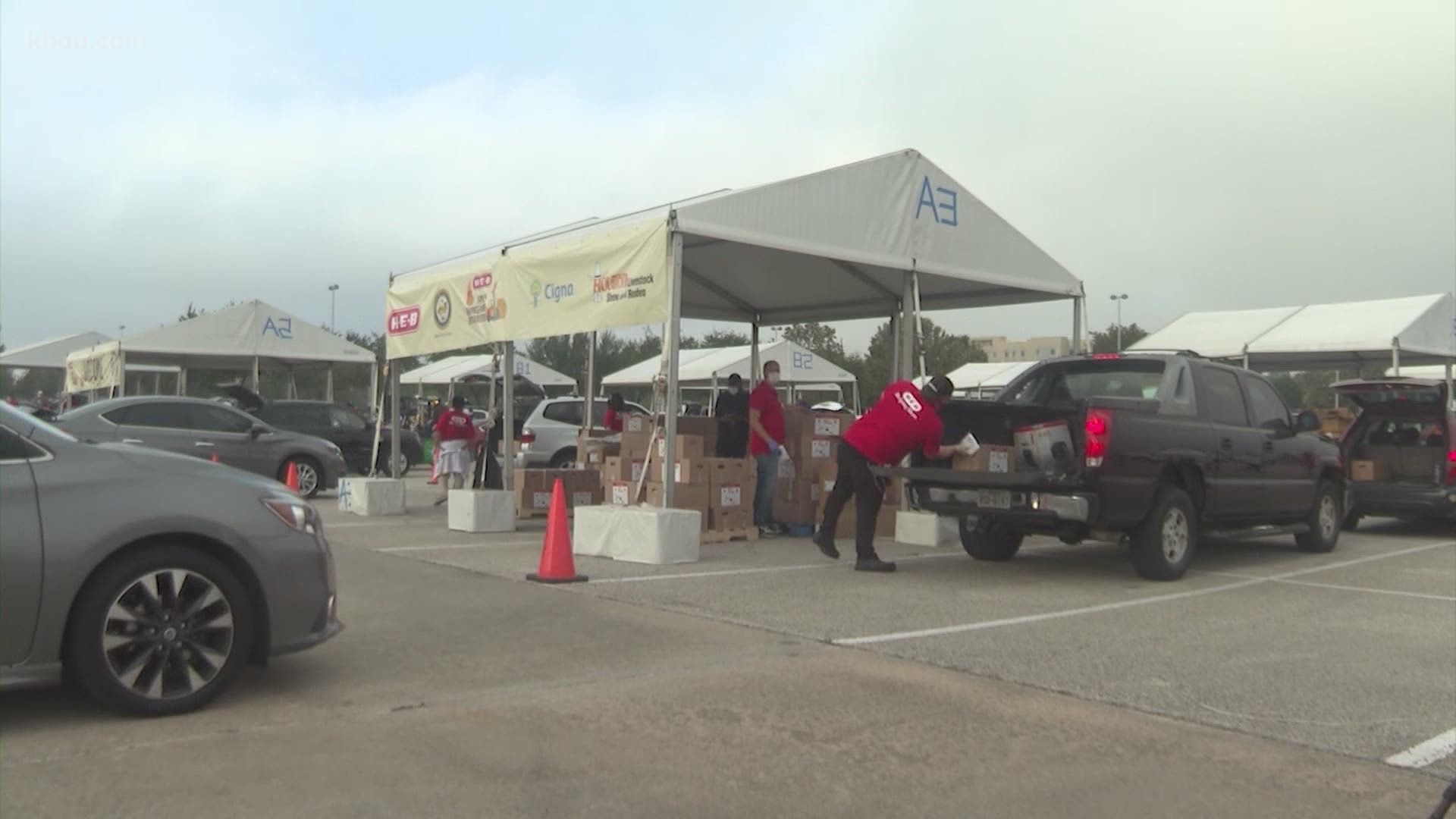 The Houston Food Bank is seeing long lines and fewer volunteers as they work to distribute more than 800,000 pounds of food every day.