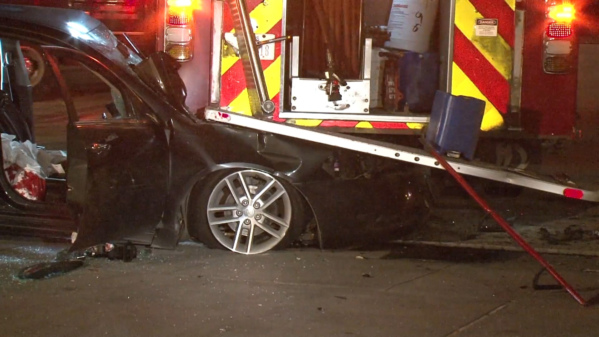 Car slams into side of fire truck backing into station | khou.com