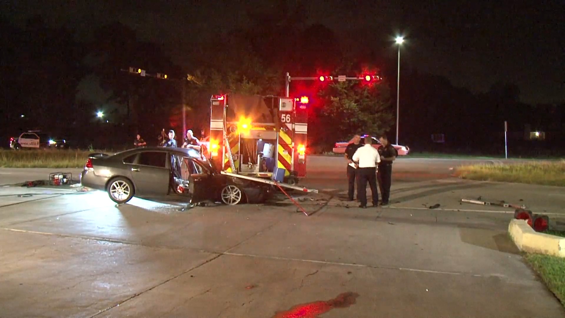 Car slams into side of fire truck backing into station | khou.com