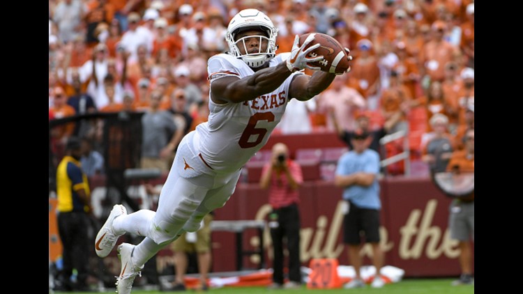 Ehlinger runs for 3 scores as Texas shocks Georgia in Sugar Bowl