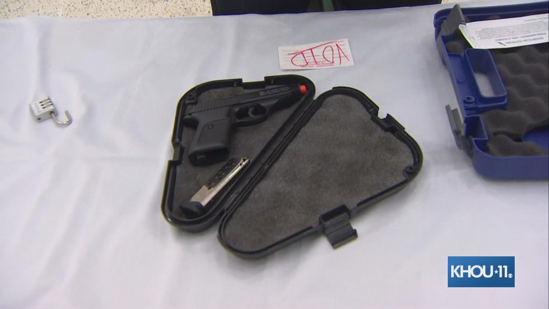 TSA demonstrated how to store a firearm in a checked bag for when you are traveling.