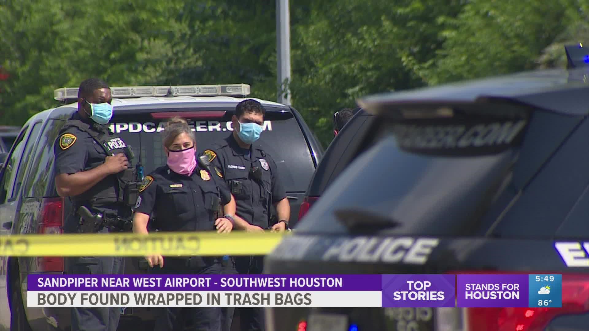 Houston police are awaiting autopsy results after a person was found wrapped in trash bags over the weekend.
