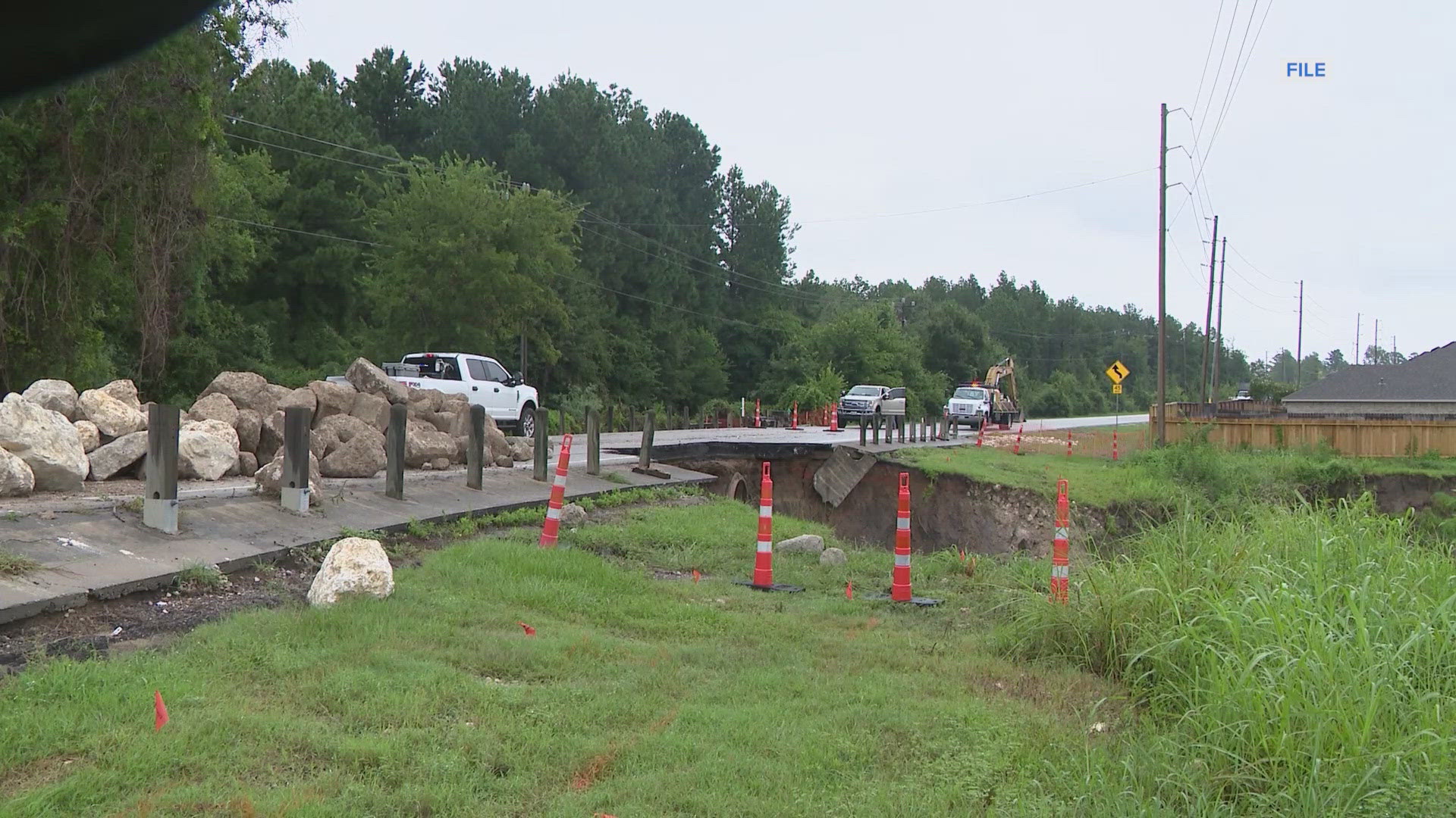 FM 1097 reopen after a large portion of the road had been washed away during a round of heavy rainfall.