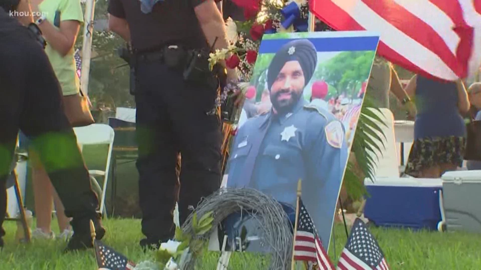 While accepting a gift during prayer service, Deputy Dhaliwal's dad told KHOU 11 that he never knew his son did so much for others.