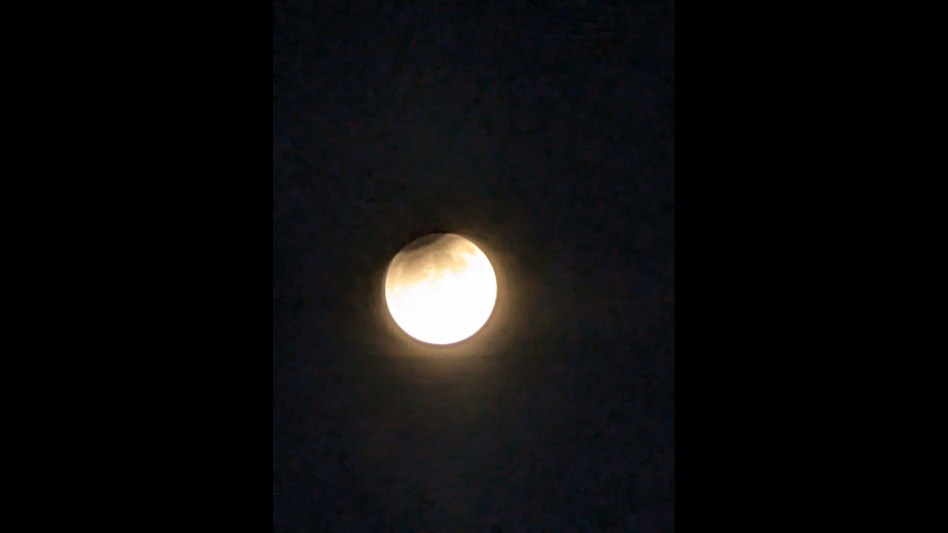 Super full harvest moon, partial lunar eclipse as seen in Houston ...