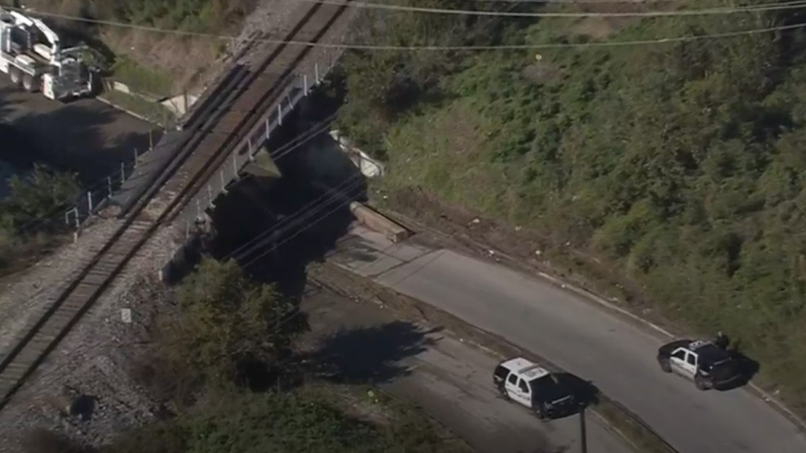 Truck hits train overpass in east Houston | khou.com