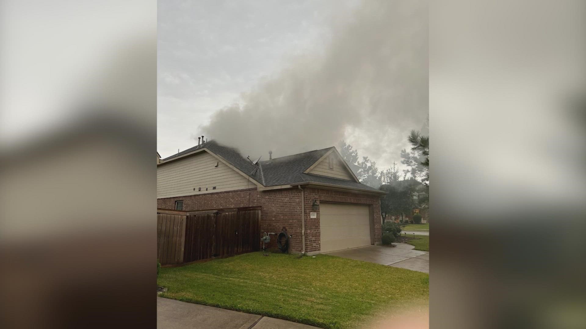 A lightning strike sparks a fire at a family's home in the Atascocita area.