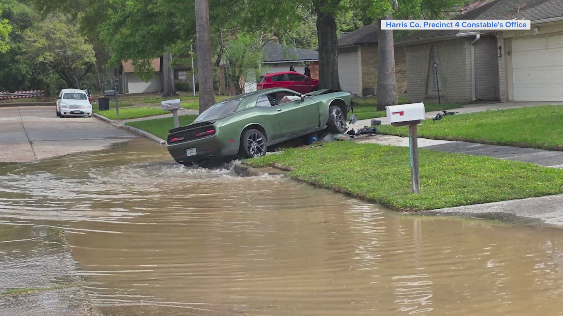 Car crash in Spring ends with arrests and a wet mess | khou.com