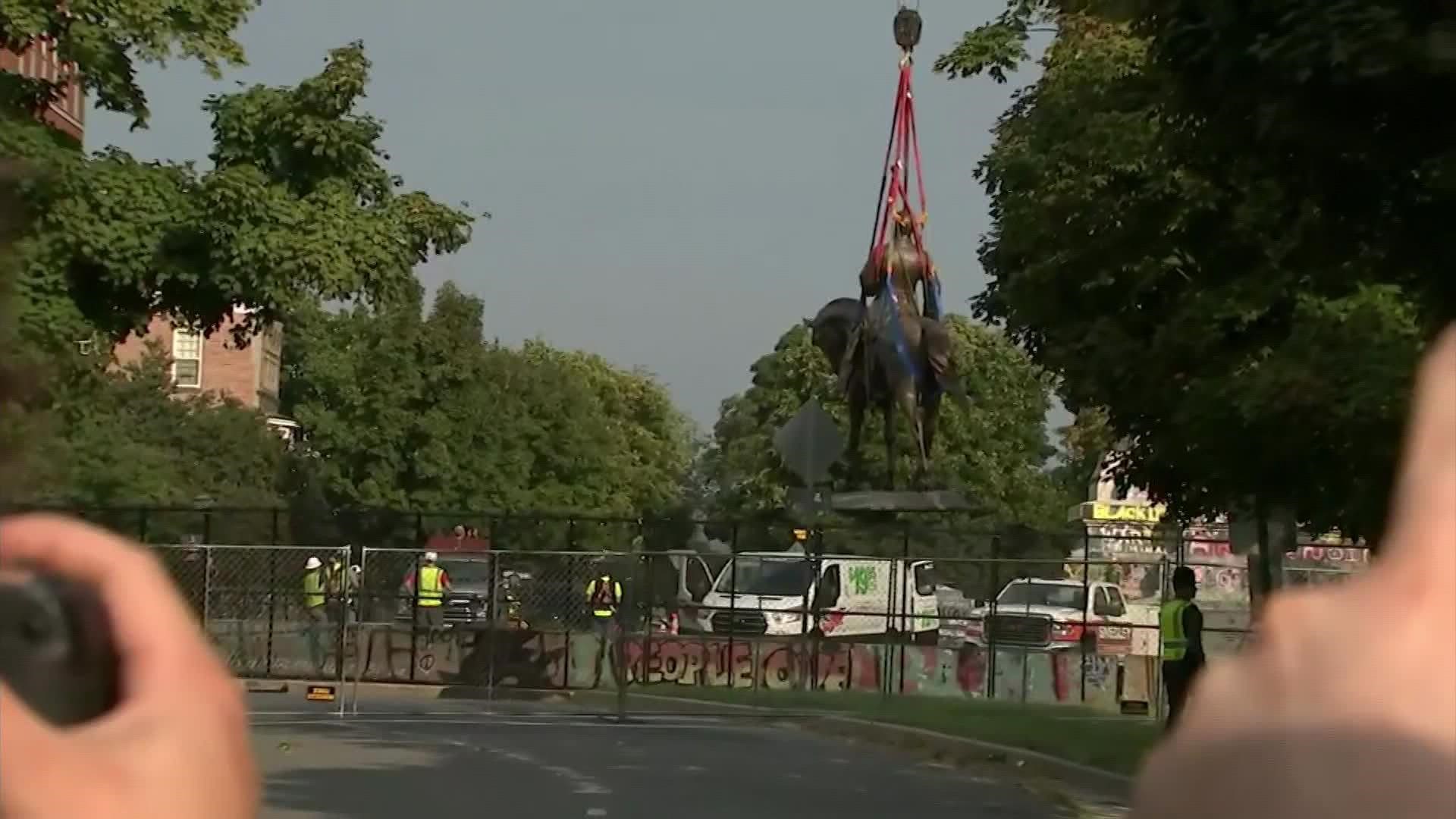 The statue of Robert E. Lee in Richmond came down Wednesday after the Virginia Supreme Court's ruling allowing its removal.