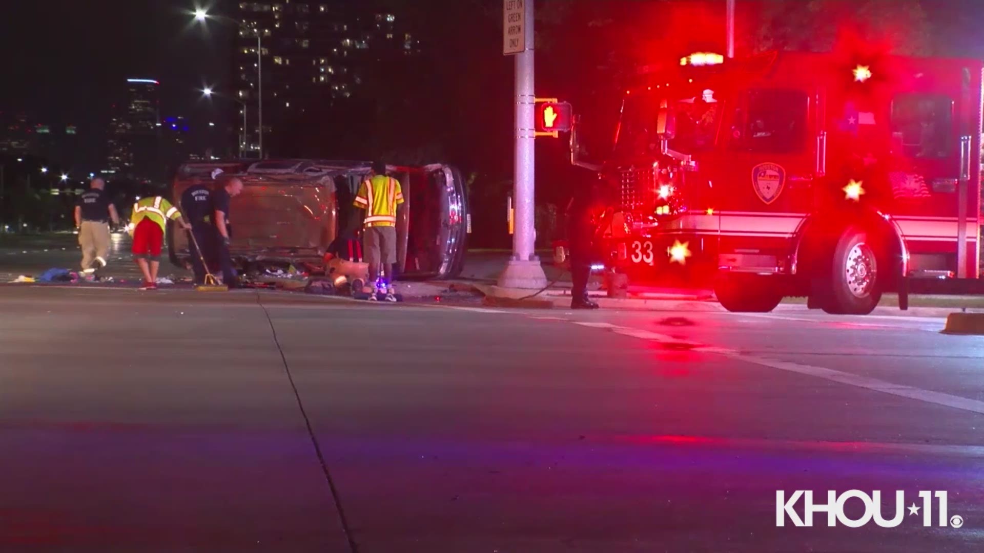 Firefighters rescued a woman who was pinned inside an SUV during a rollover crash in the Texas Medical Center Monday night.