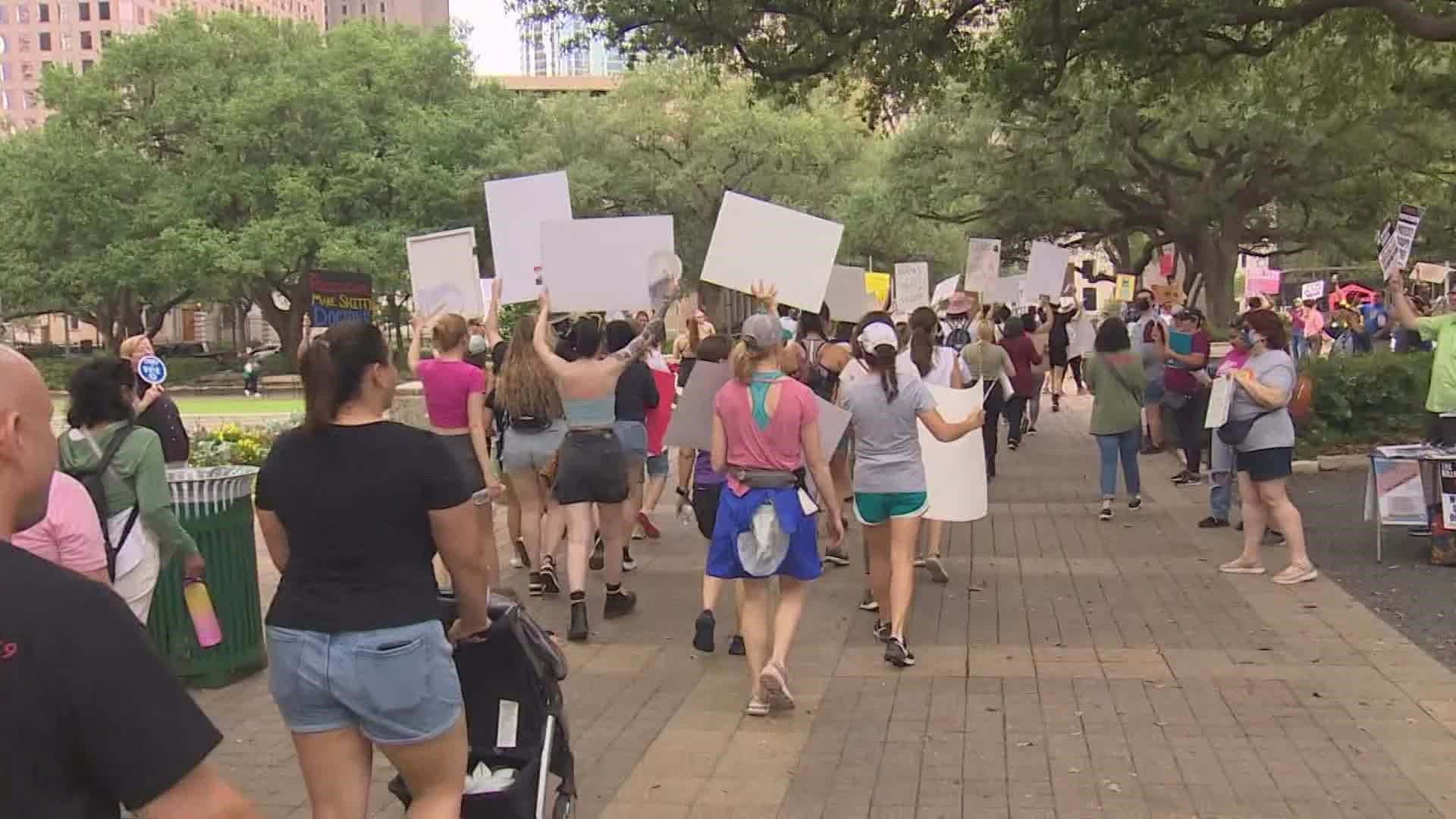 On Saturday, dozens of protestors took to the steps of Houston's City Hall for a "Bans off our Bodies” rally.