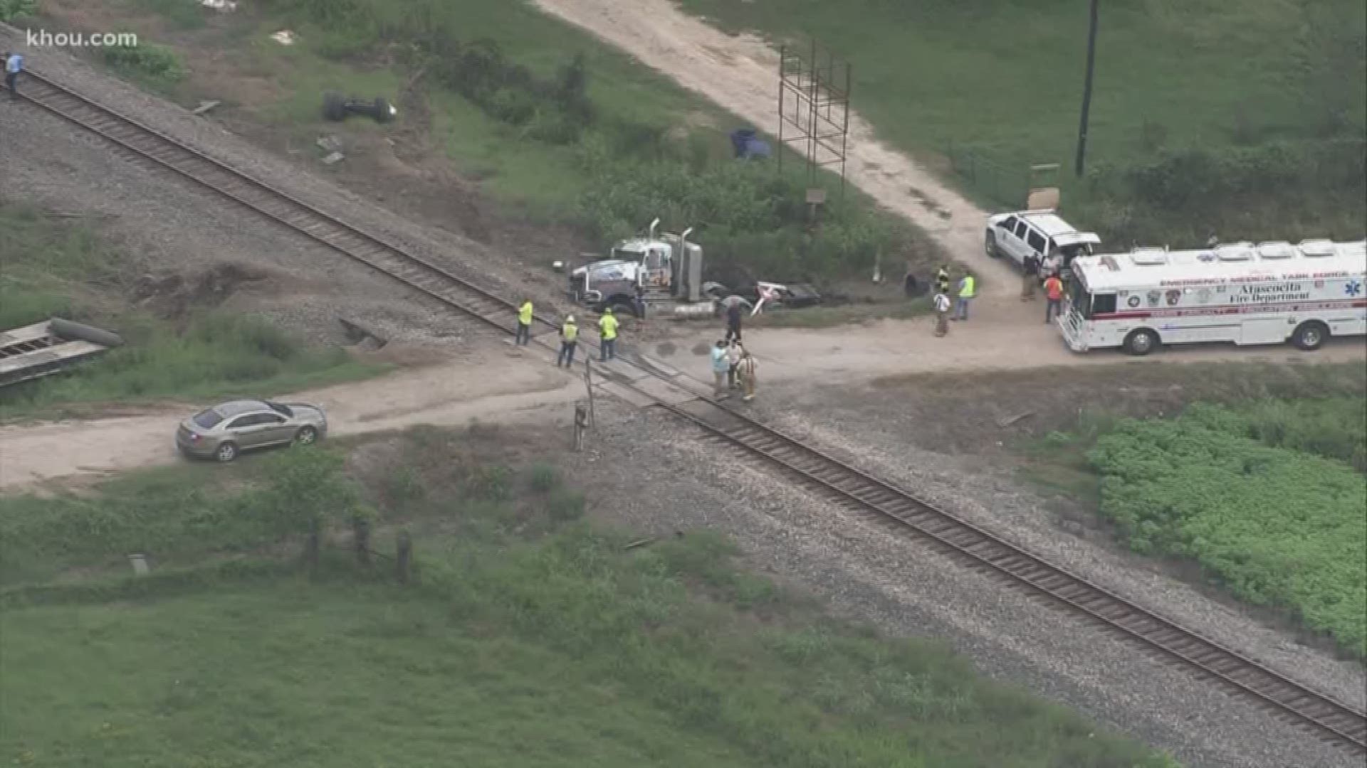 19 people were injured Friday after an Amtrak train derailed and collided with an 18-wheeler in Liberty County.