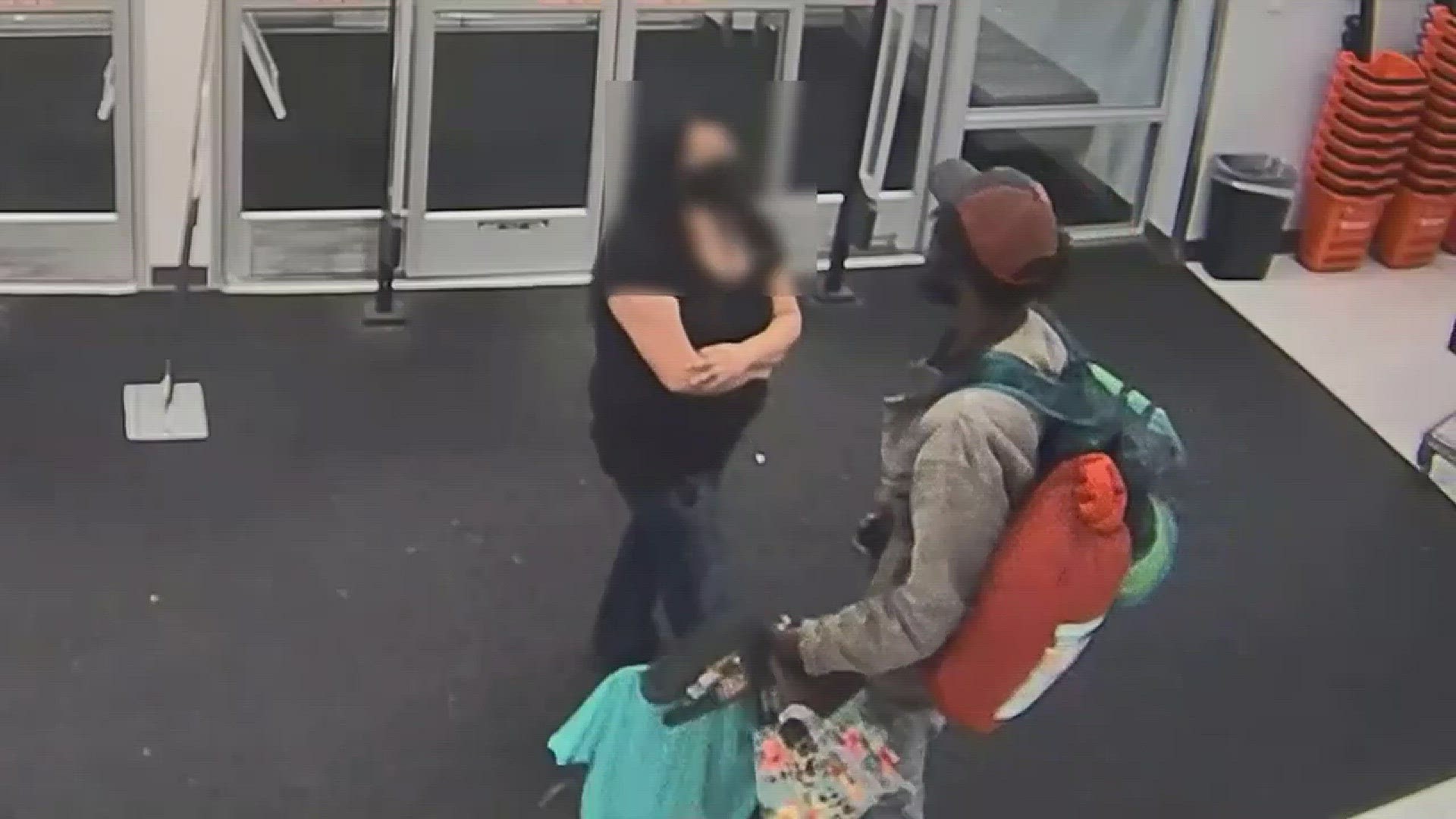 Two women used shopping carts to try and prevent the guy from leaving. When one dropped her phone, he grabbed it, pushed her down and ran out the door.