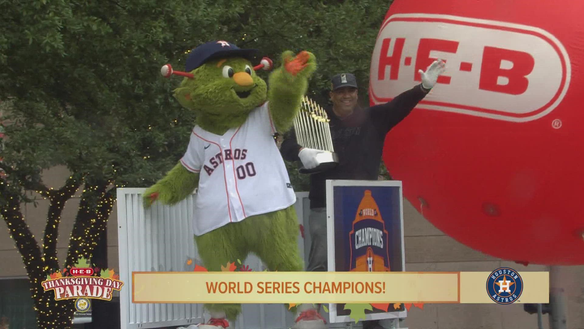 Several high school and college marching bands entertained the H-E-B Thanksgiving Day Parade crowd. Astros mascot Orbit was also there with the World Series Trophy.