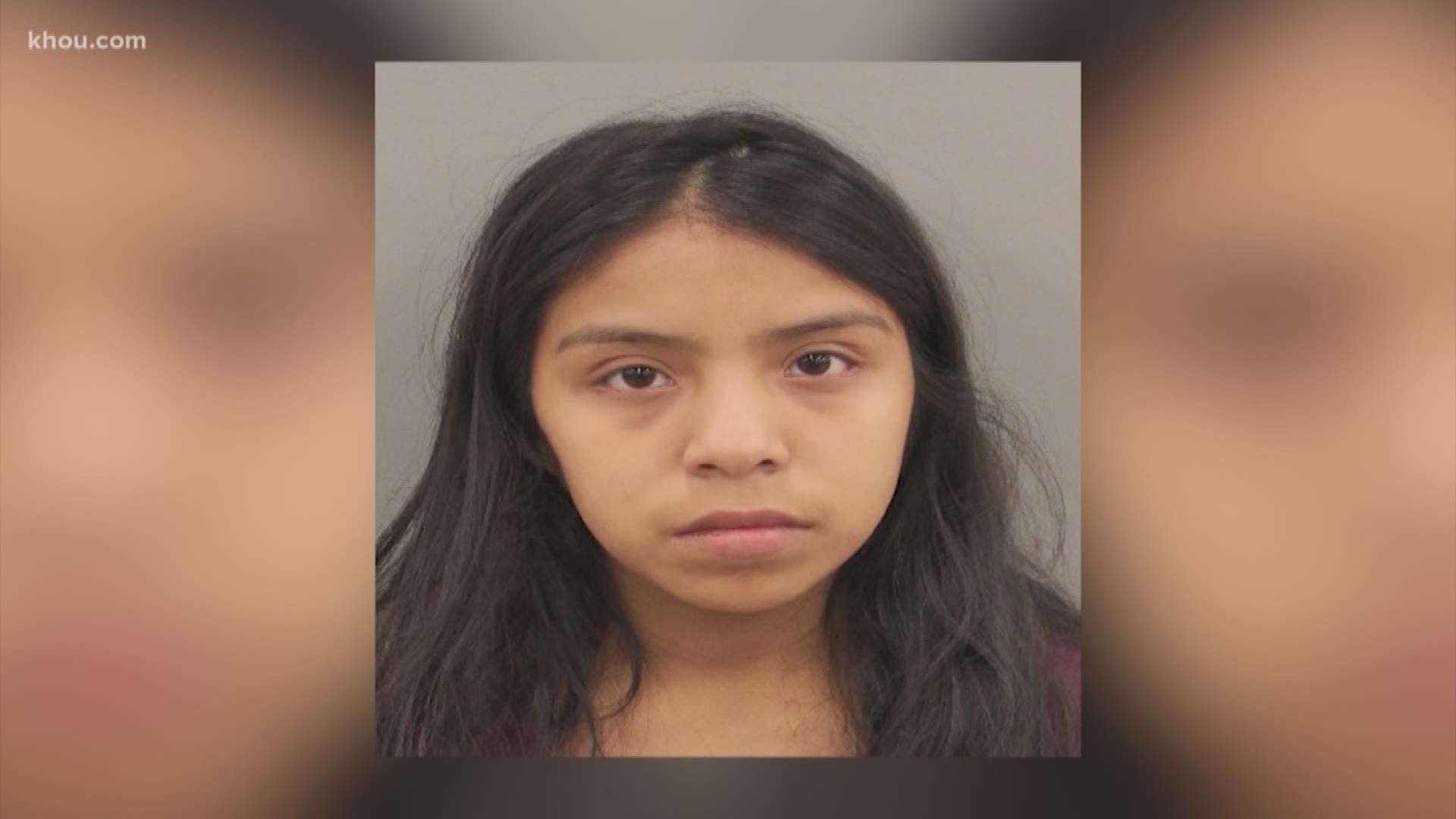 A mother has been charged in connection with the death of her infant son after he was hit by a car in a parking lot.