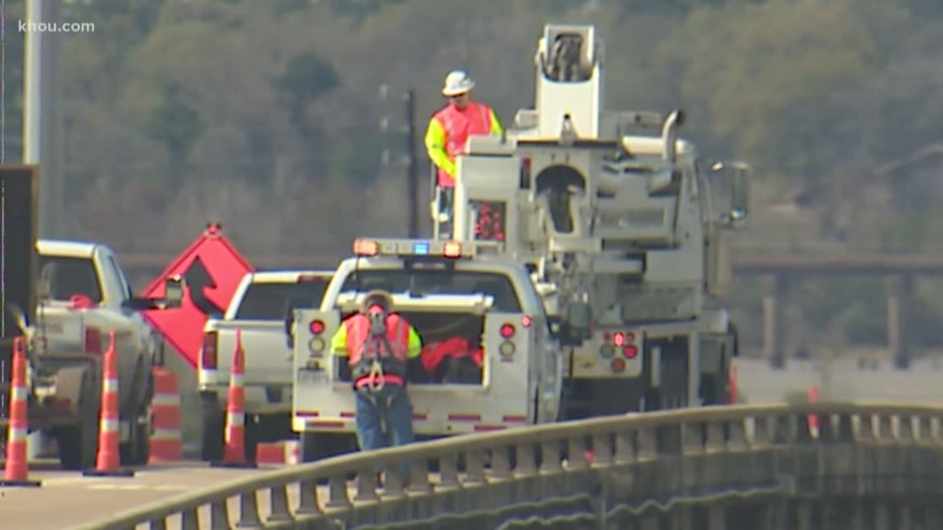 Crews continue to make emergency repairs on the I-10 East bridge over the San Jacinto River after a barge struck it on Monday afternoon.