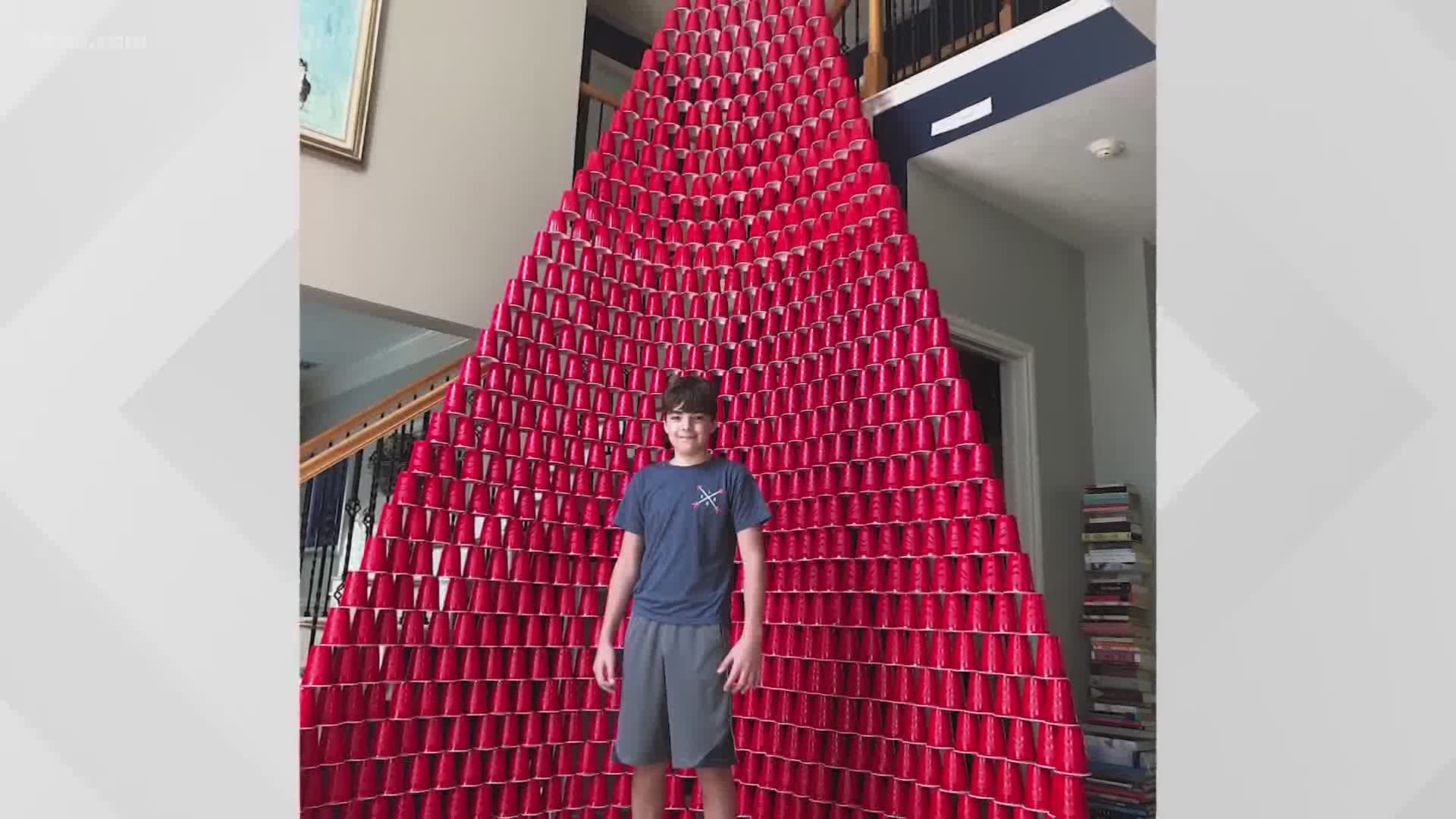 David Harder is keeping himself busy amid the coronavirus pandemic by building a tower using plastic cups from Costco.