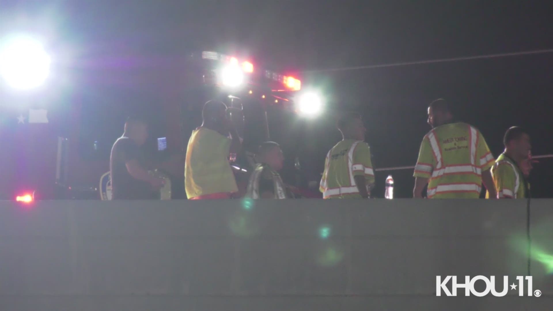 Two deputies were injured and a prisoner died after their SUV was struck by a suspected drunken driver going to the wrong way in west Harris County overnight, the sheriff confirmed.