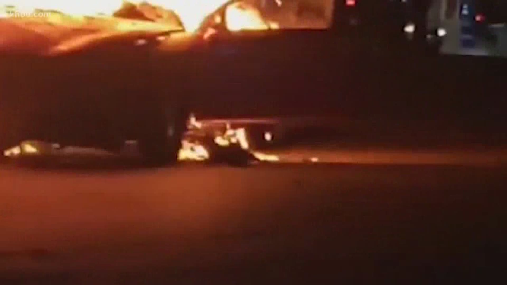 Two good Samaritans are credited with helping save the life of a man who was caught in a burning car overnight.