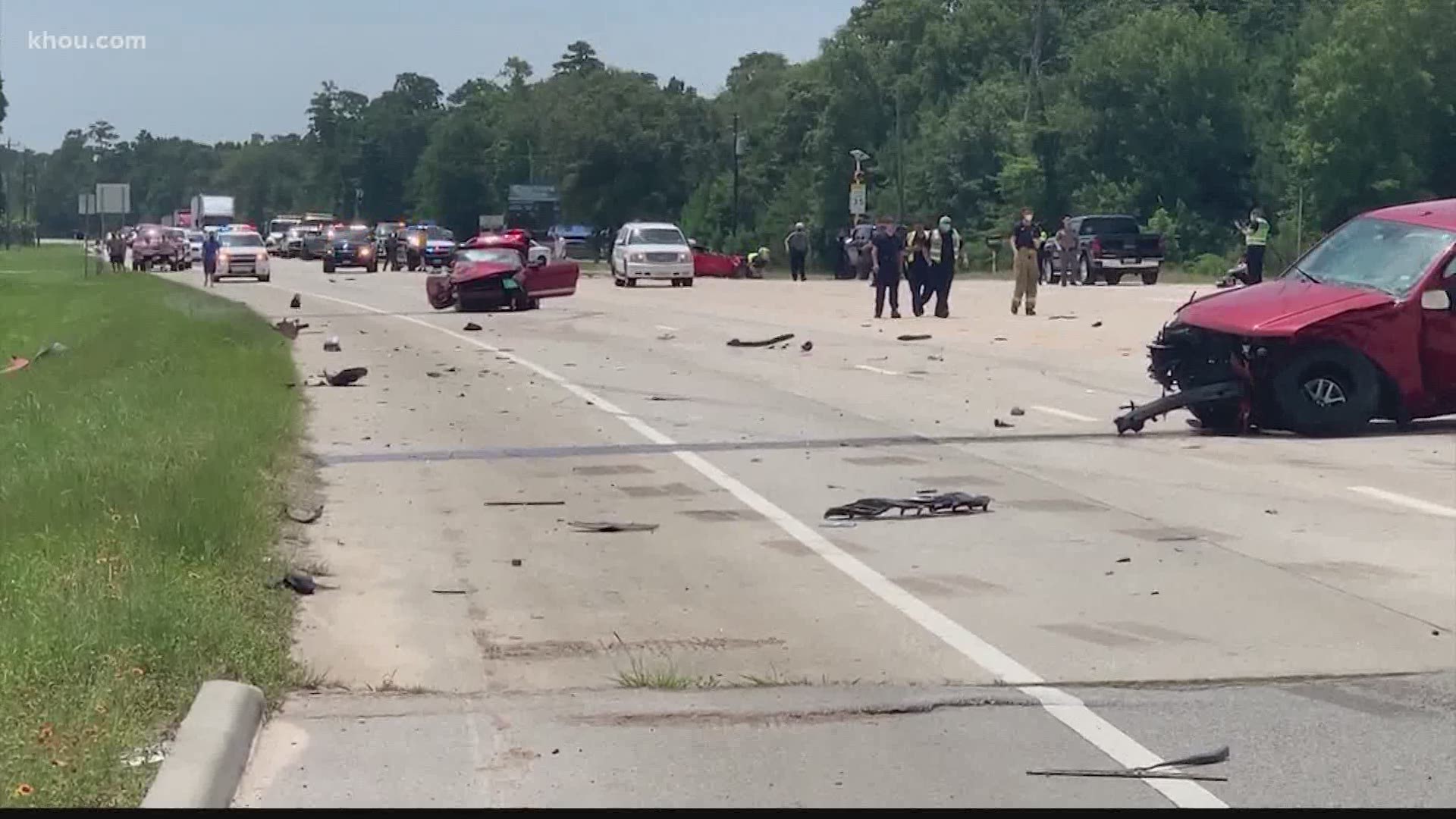 Investigators said they think two Mustangs were racing when they hit a truck. One of the cars then struck a motorcycle head-on, killing the rider.