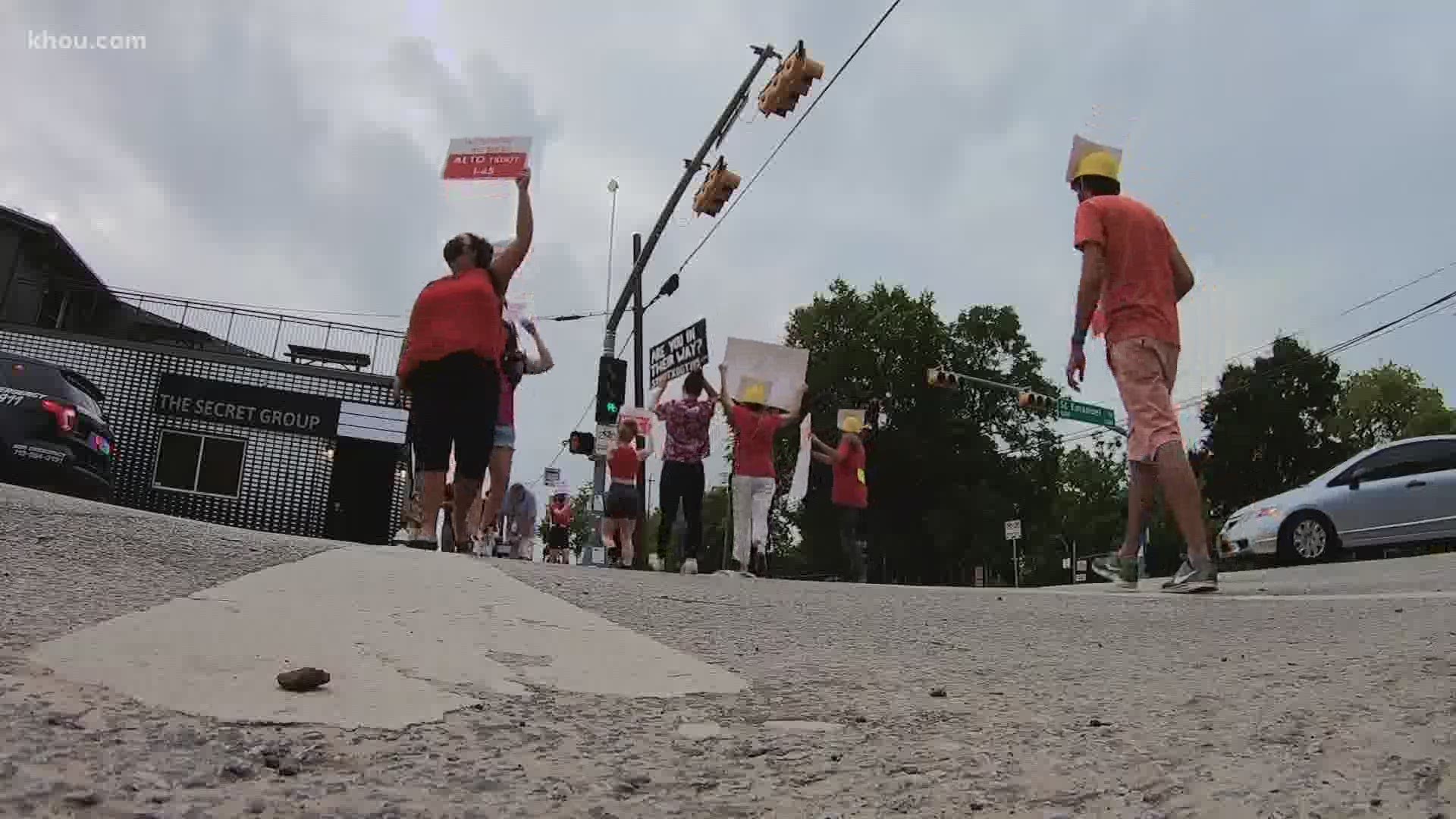 More than a dozen people gathered in east Downtown Houston Thursday morning to protest the expansion of I-45.
